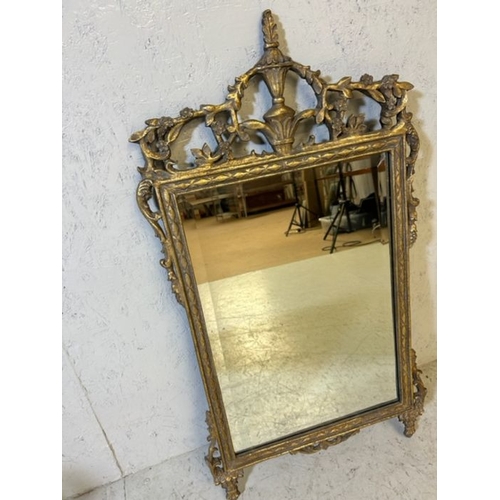 63 - Antique bevel edge Mirror in ornate gilt frame the mirror 41 x 59cm