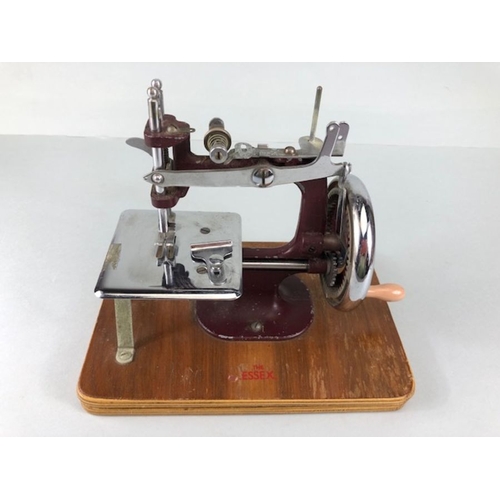 70 - Vintage toys,  1950s vintage child's sewing machine the Essex Mk1 inc sewing platform.