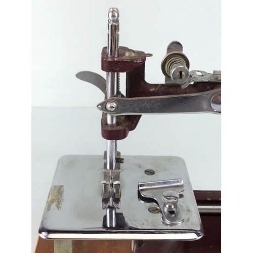 70 - Vintage toys,  1950s vintage child's sewing machine the Essex Mk1 inc sewing platform.