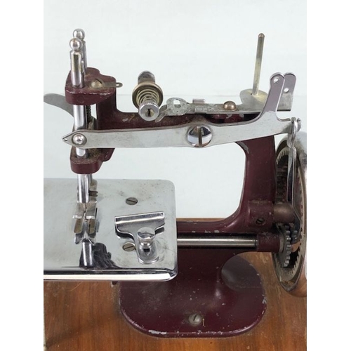 70 - Vintage toys,  1950s vintage child's sewing machine the Essex Mk1 inc sewing platform.