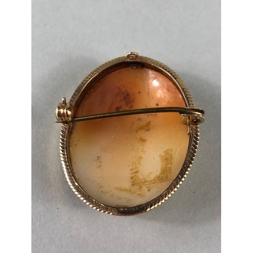 74 - Gold Jewellery, 9ct rose gold watch strap approximately 7.80g and a 9ct gold mounted shell cameo.