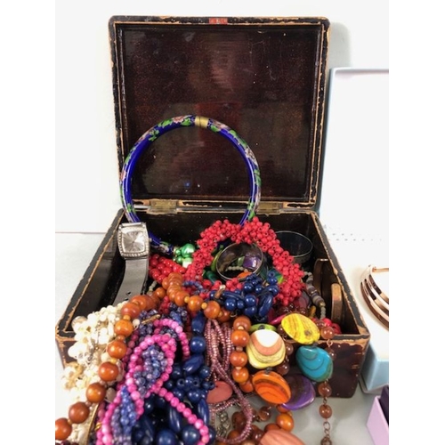 79 - Costume Jewellery, a quantity of vintage costume jewellery, to include strings of beads, pearl neckl... 