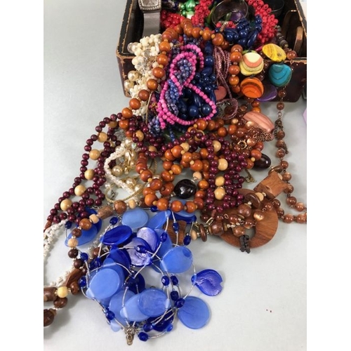 79 - Costume Jewellery, a quantity of vintage costume jewellery, to include strings of beads, pearl neckl... 