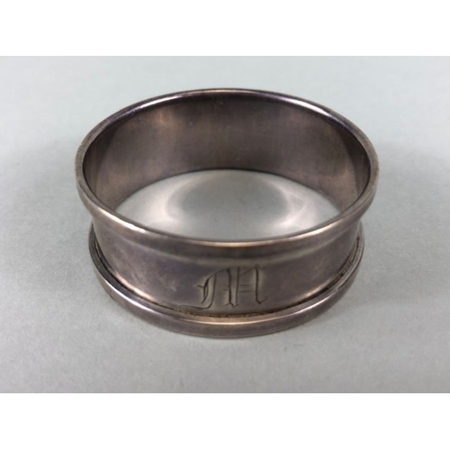 8 - Hallmarked silver items to include napkin rings and a silver hallmarked propelling pencil (4)