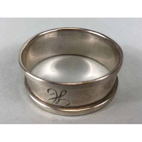 8 - Hallmarked silver items to include napkin rings and a silver hallmarked propelling pencil (4)