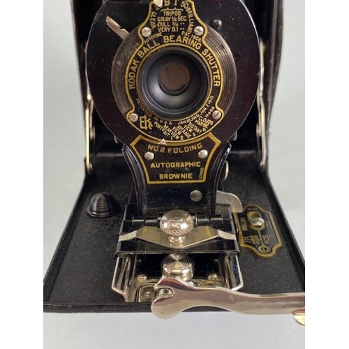 84 - Scientific interest, 3 draw t telescope with leather binding, 1922 Folding Autographic Brownie Camer... 