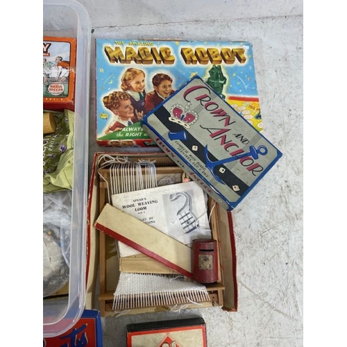 88 - Vintage toys, a quantity of 20th century games, to include , New Footy football, Magic Robot, Monopo... 