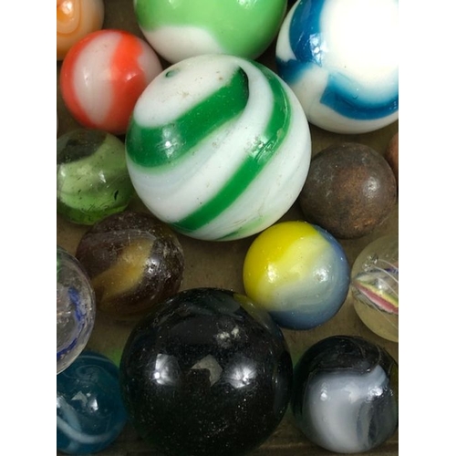 99 - Antique marbles, collection of glass Victorian marbles to include bulls eyes and venetians, in a bag