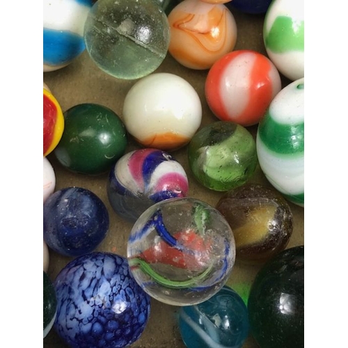 99 - Antique marbles, collection of glass Victorian marbles to include bulls eyes and venetians, in a bag