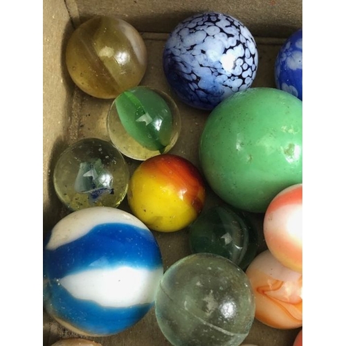 99 - Antique marbles, collection of glass Victorian marbles to include bulls eyes and venetians, in a bag