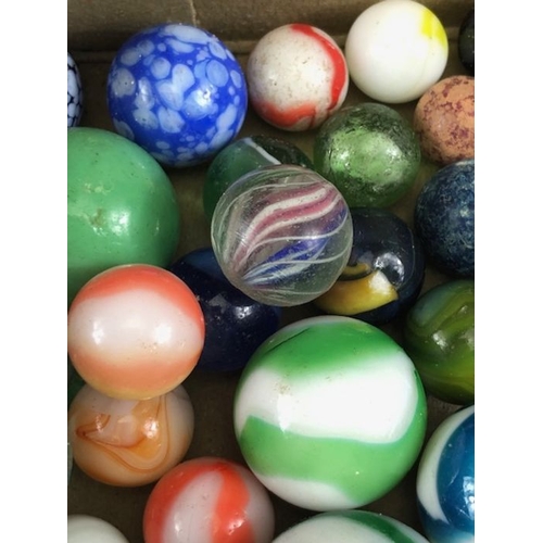 99 - Antique marbles, collection of glass Victorian marbles to include bulls eyes and venetians, in a bag