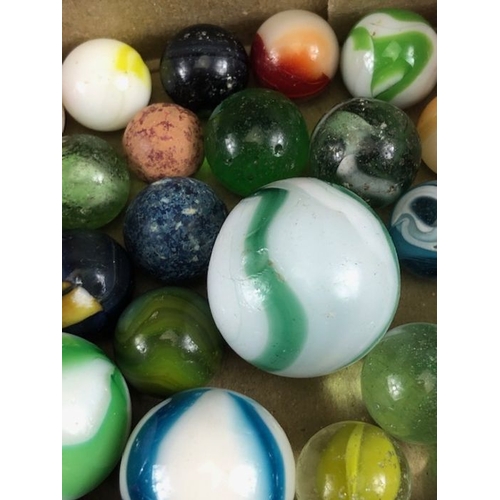 99 - Antique marbles, collection of glass Victorian marbles to include bulls eyes and venetians, in a bag