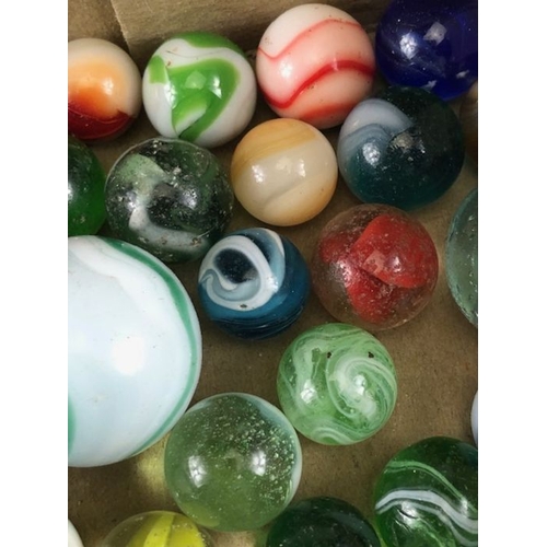 99 - Antique marbles, collection of glass Victorian marbles to include bulls eyes and venetians, in a bag