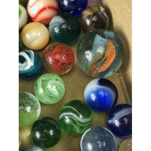 99 - Antique marbles, collection of glass Victorian marbles to include bulls eyes and venetians, in a bag