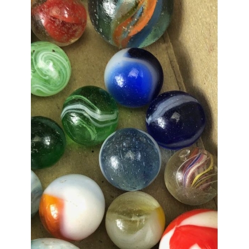 99 - Antique marbles, collection of glass Victorian marbles to include bulls eyes and venetians, in a bag