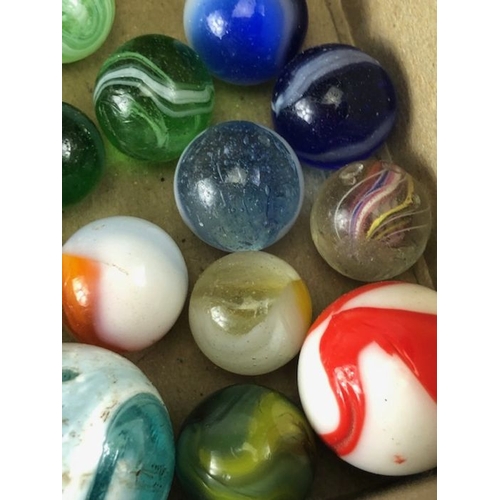 99 - Antique marbles, collection of glass Victorian marbles to include bulls eyes and venetians, in a bag