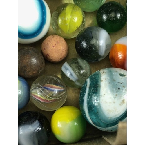 99 - Antique marbles, collection of glass Victorian marbles to include bulls eyes and venetians, in a bag