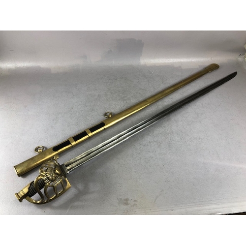217 - Swords, French Napoleonic style sword, double fullered blade with brass half shell hilt, leather wir... 