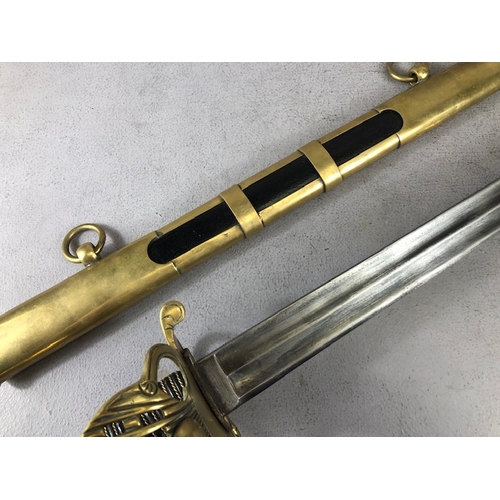 217 - Swords, French Napoleonic style sword, double fullered blade with brass half shell hilt, leather wir... 