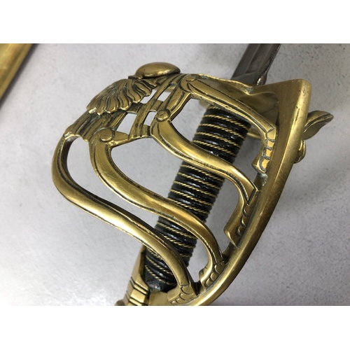217 - Swords, French Napoleonic style sword, double fullered blade with brass half shell hilt, leather wir... 