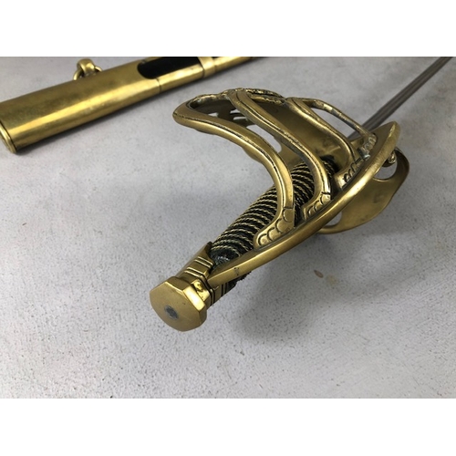 217 - Swords, French Napoleonic style sword, double fullered blade with brass half shell hilt, leather wir... 