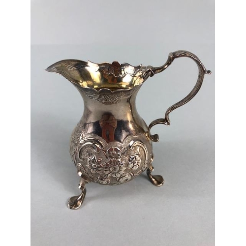 1 - Victorian Silver Hallmarked and repousse cream jug on splayed legs hallmarked for London by maker Be... 