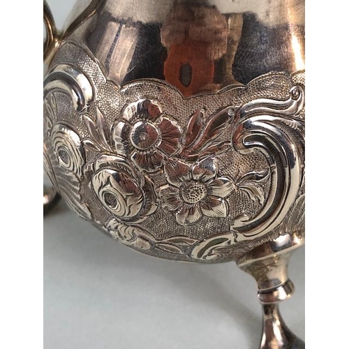 1 - Victorian Silver Hallmarked and repousse cream jug on splayed legs hallmarked for London by maker Be... 