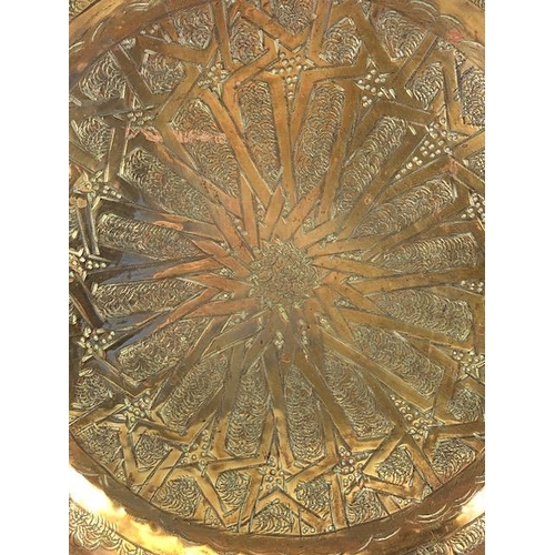 101 - Decorative Brass and copper plates , the brass plate of Islamic design approximately 34cm across, th... 