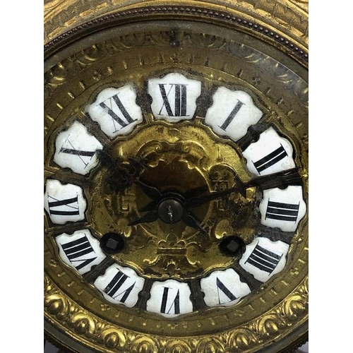 107A - Antique Clock, Louis style elaborately decorated brass cased mantel clock with Roman numeral dial, a... 