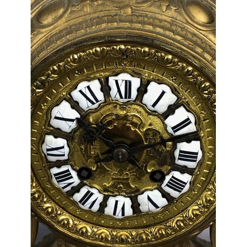 107A - Antique Clock, Louis style elaborately decorated brass cased mantel clock with Roman numeral dial, a... 