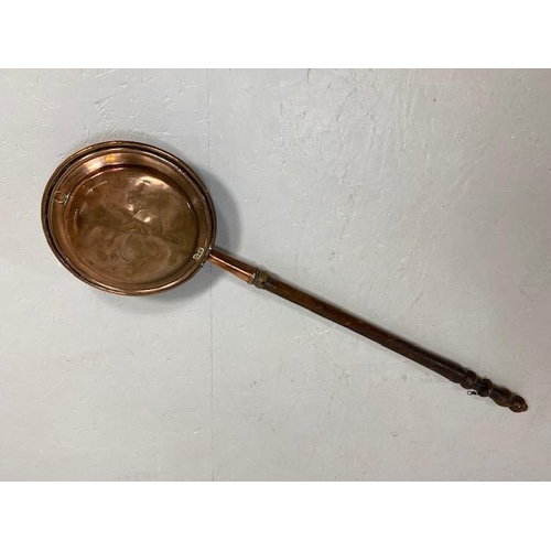 108 - Antique copper bed warming pan with  chased decoration to front, turned wooden spindle handle