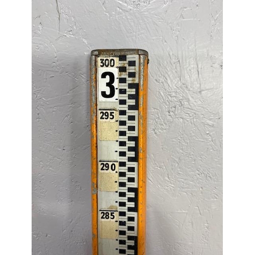 119 - Scientific instruments, surveyors measure rod, 2 section pressed metal orange painted finish and 2 l... 