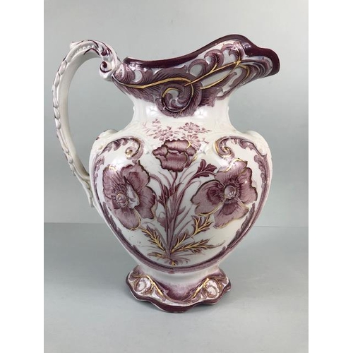 123 - Decorative China, large Victorian water jug decorated with magenta flowers  on a white background an... 