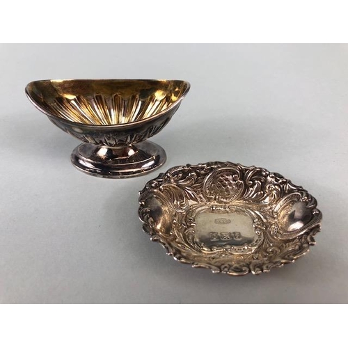 13 - Two hallmarked silver salts one on a pedestal base with gold gilt interior the other on a flat base ... 