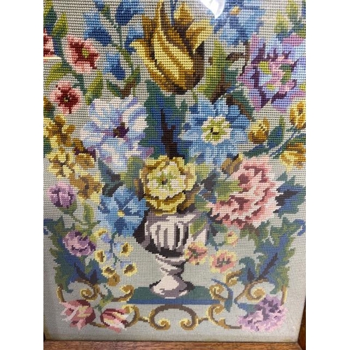 137 - Wool work and tapestry pictures, two late 20th century wool pictures one of a vase of flowers, the o... 