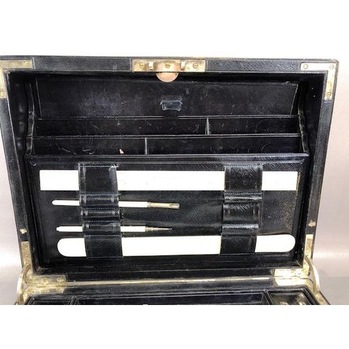 141 - Antique traveling writing box, by Parkins and Gotto 24 & 25 Oxford street, black Moroccan leather bo... 