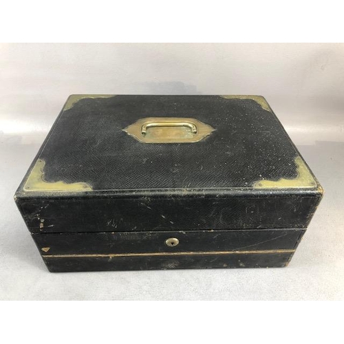 141 - Antique traveling writing box, by Parkins and Gotto 24 & 25 Oxford street, black Moroccan leather bo... 