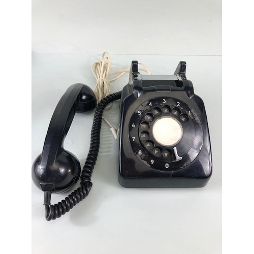 148 - Vintage telephone, Black plastic 1990s ITT dial telephone with plug in cord  A.F