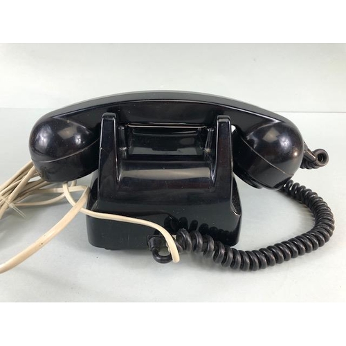 148 - Vintage telephone, Black plastic 1990s ITT dial telephone with plug in cord  A.F