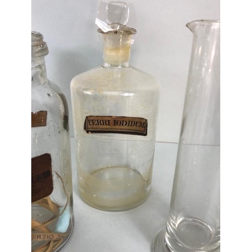 149A - Apothecary Chemist, quantity of vintage glass chemist bottles and jars some with labels, 18 items in... 