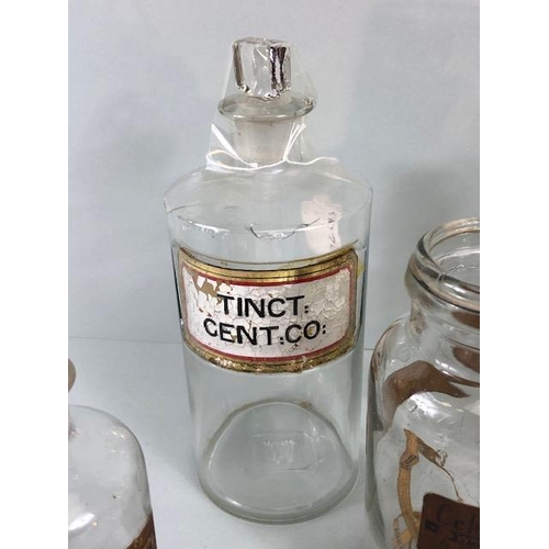 149A - Apothecary Chemist, quantity of vintage glass chemist bottles and jars some with labels, 18 items in... 