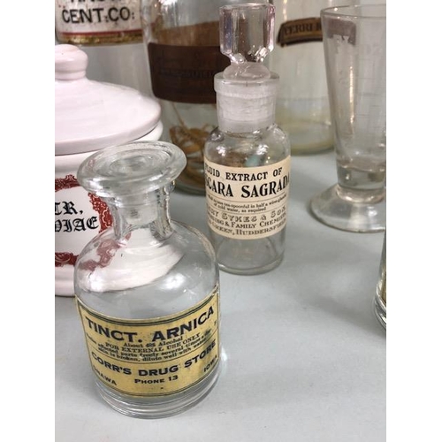 149A - Apothecary Chemist, quantity of vintage glass chemist bottles and jars some with labels, 18 items in... 