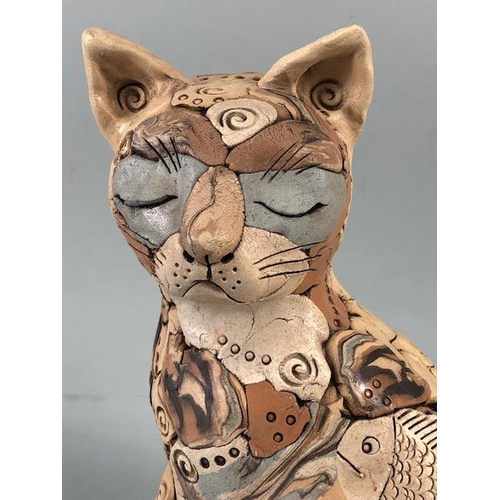 152 - Studio Pottery, multi colour jigsaw pottery figure of a content cat with a fish, matt glaze finish a... 