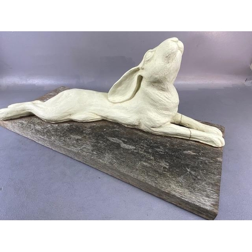 165 - Art pottery, ceramics, life size sculpture of a hare lying down and staring at the sky mounted on a ... 