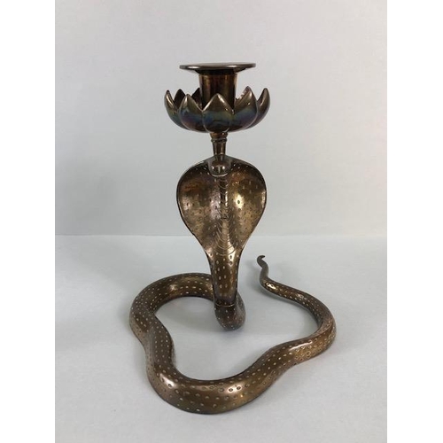 165A - Candle sticks, pair of Indian brass candlesticks fashioned as hooded Cobras the candle holders as li... 