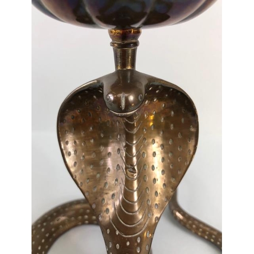 165A - Candle sticks, pair of Indian brass candlesticks fashioned as hooded Cobras the candle holders as li... 