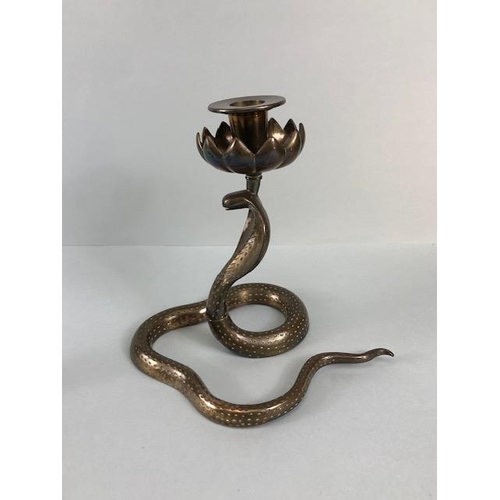 165A - Candle sticks, pair of Indian brass candlesticks fashioned as hooded Cobras the candle holders as li... 