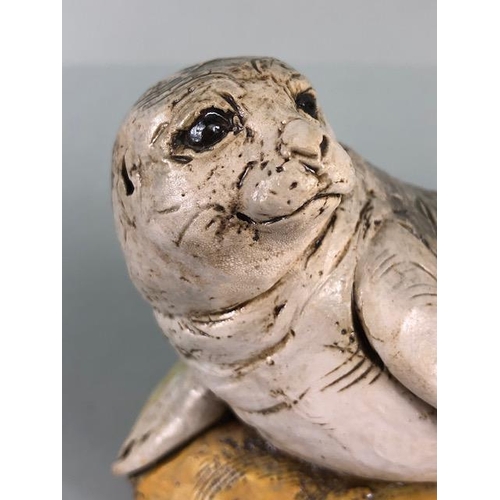 181 - Studio Art pottery, study of a seal pup on a rock signed D.C 2017 No2 to edge of base  approximately... 