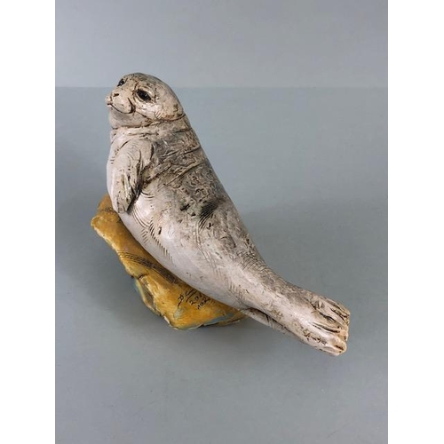 181 - Studio Art pottery, study of a seal pup on a rock signed D.C 2017 No2 to edge of base  approximately... 