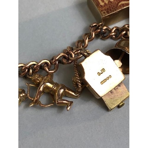 2 - 9ct Gold Charm Bracelet with approx seventeen charms to include Cupid, a British Passport, Archer, c... 